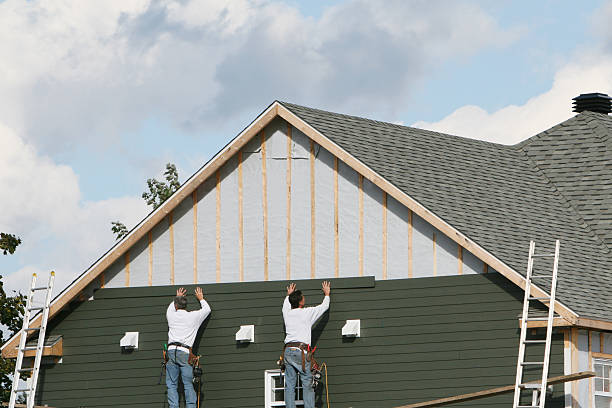 Professional Siding technician working in Gates, NC